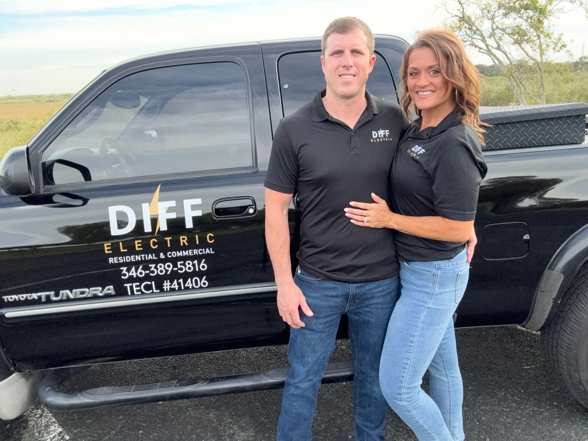 William and his wife beside their Diff Electric truck