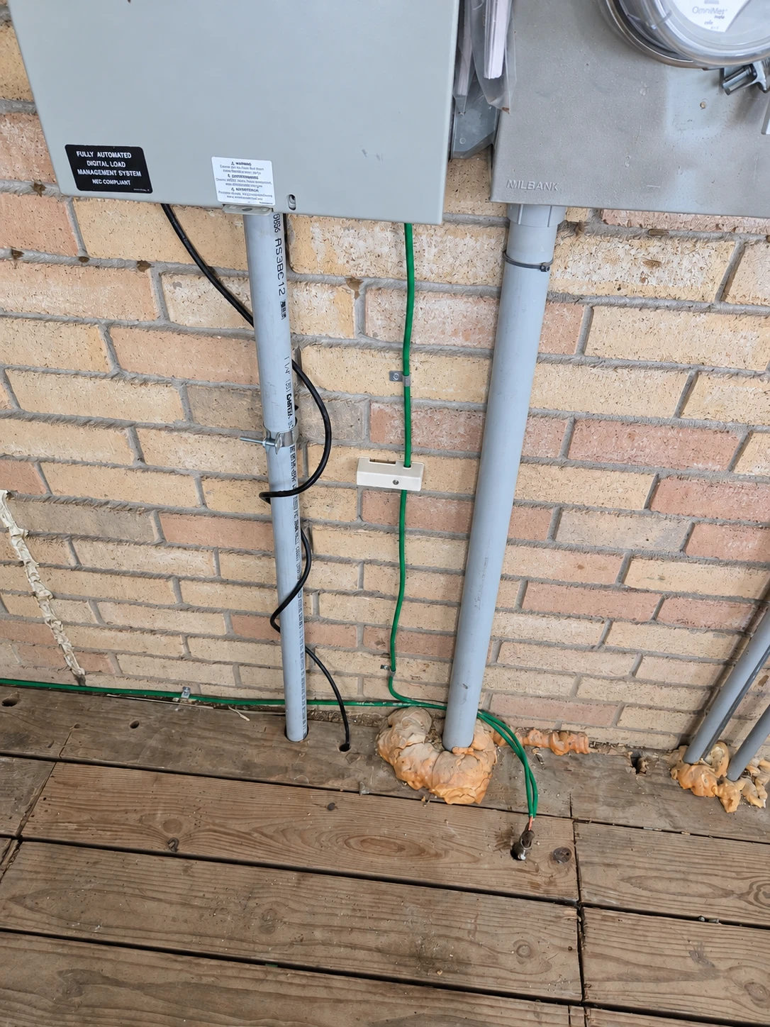 Green grounding conductor, intersystem bonding bridge and ground rod connection at a Diff Electric project